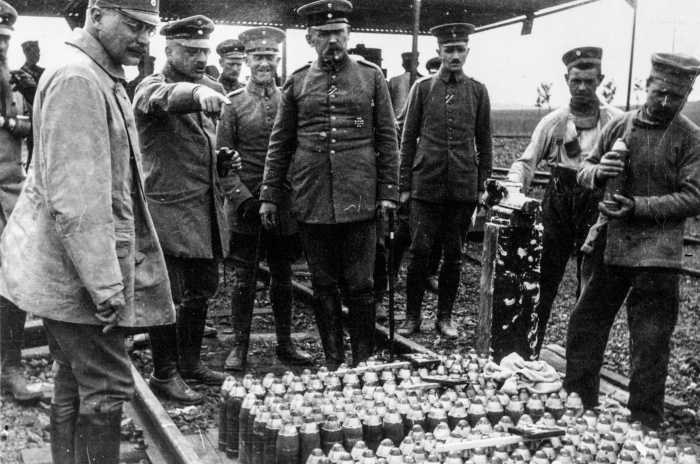 Haber (pointing) instructs soldiers about chlorine gas deployment in WWI.