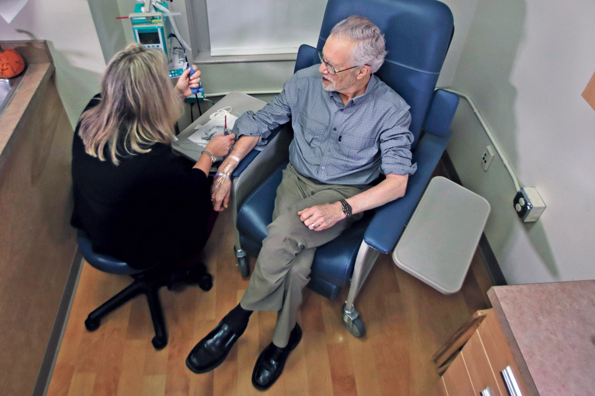 Charles Flagg receiving an infusion of Aduhelm at Butler Hospital in Providence, Rhode Island.